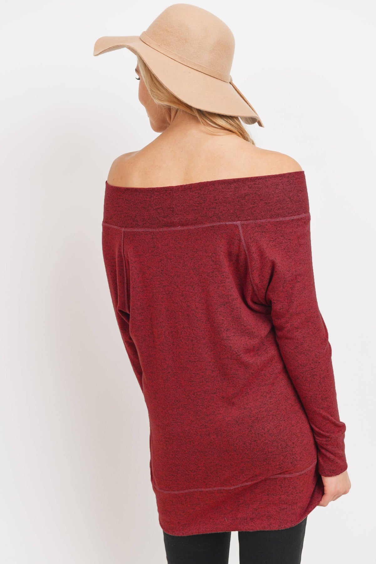 Back view of a woman wearing the burgundy off the shoulder maternity knit top